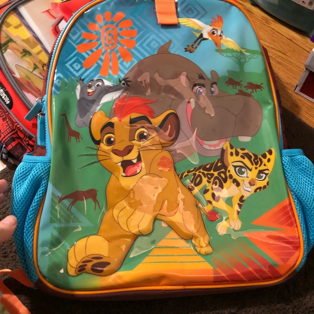 Lion guard hood backpack